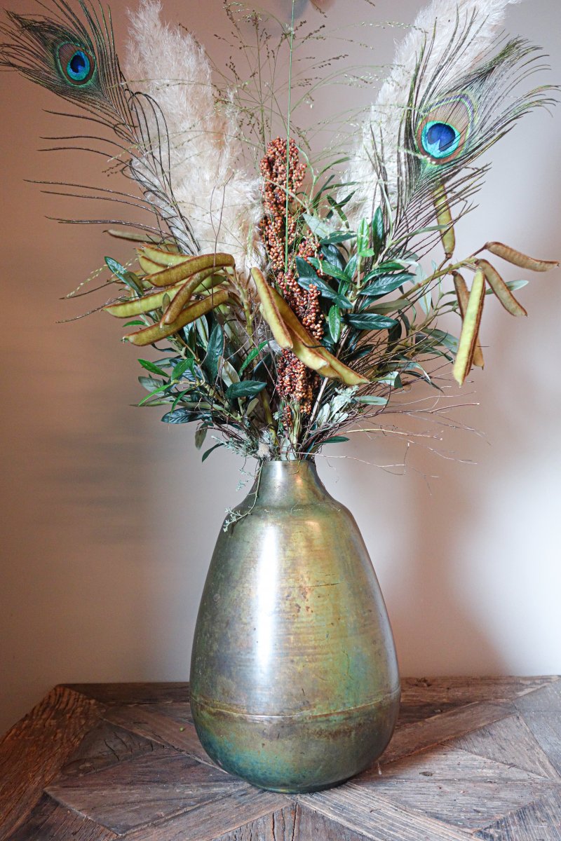 Droogboeket met pauwenveren